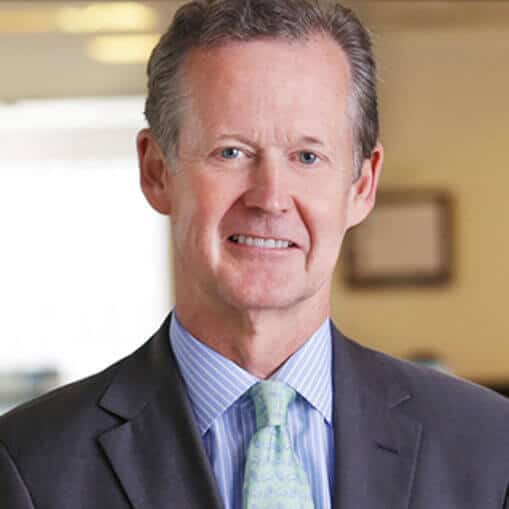 financial advisor in green tie