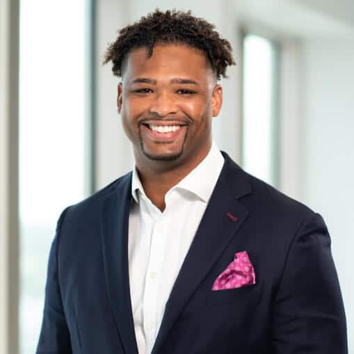 financial advisor with pink pocket square