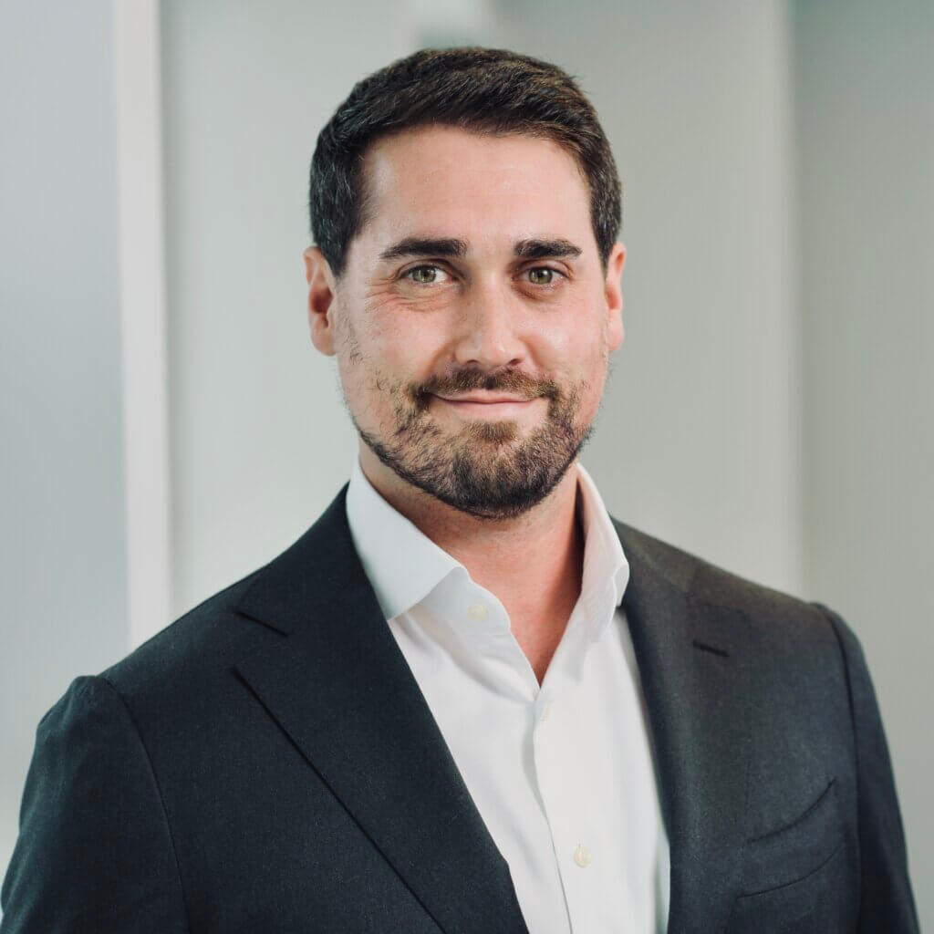 man with beard in a suit