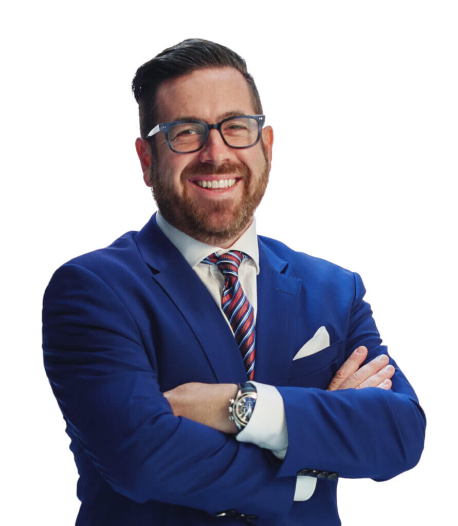 Man in blue suit with arms crossed